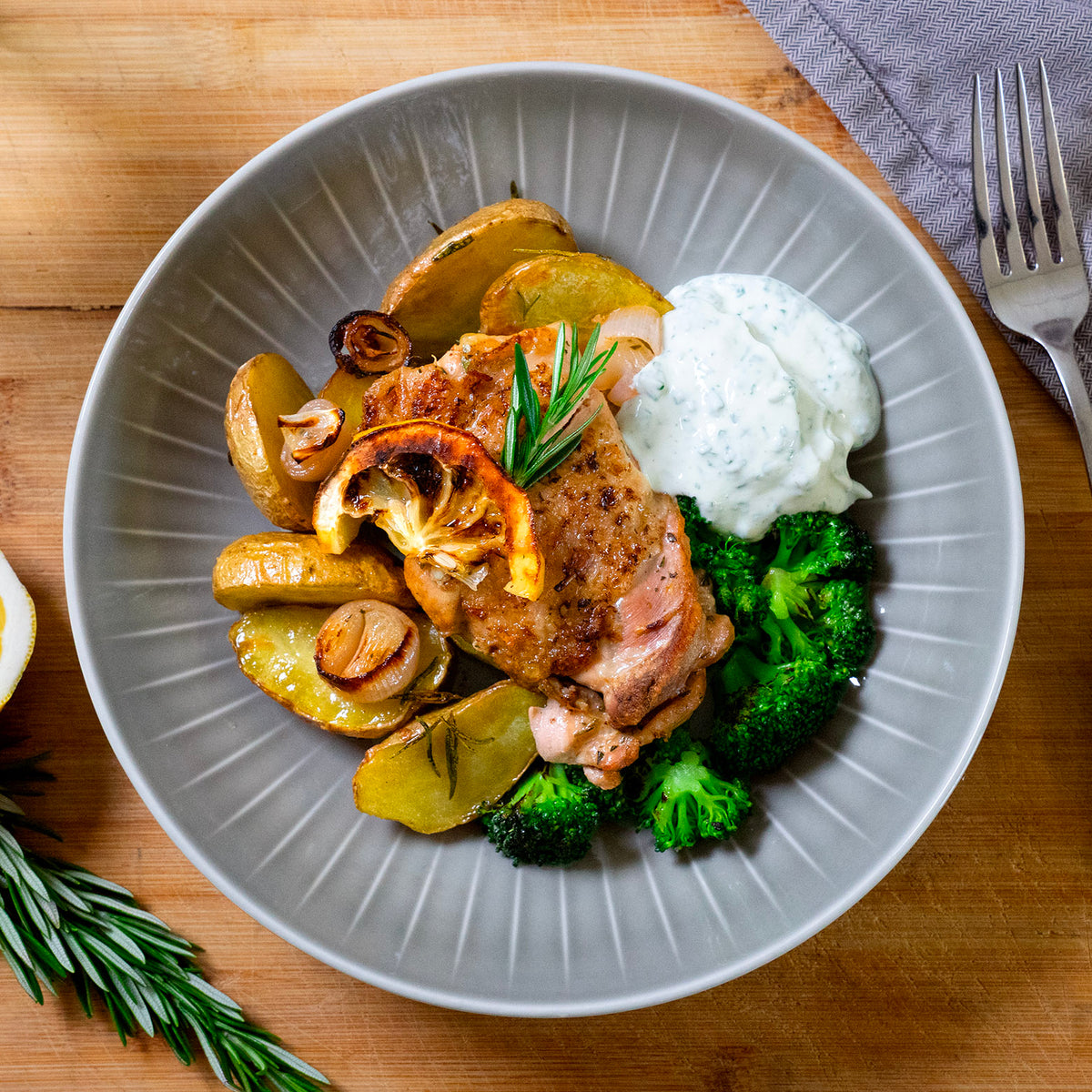 Marinated chicken leg steak with lemons